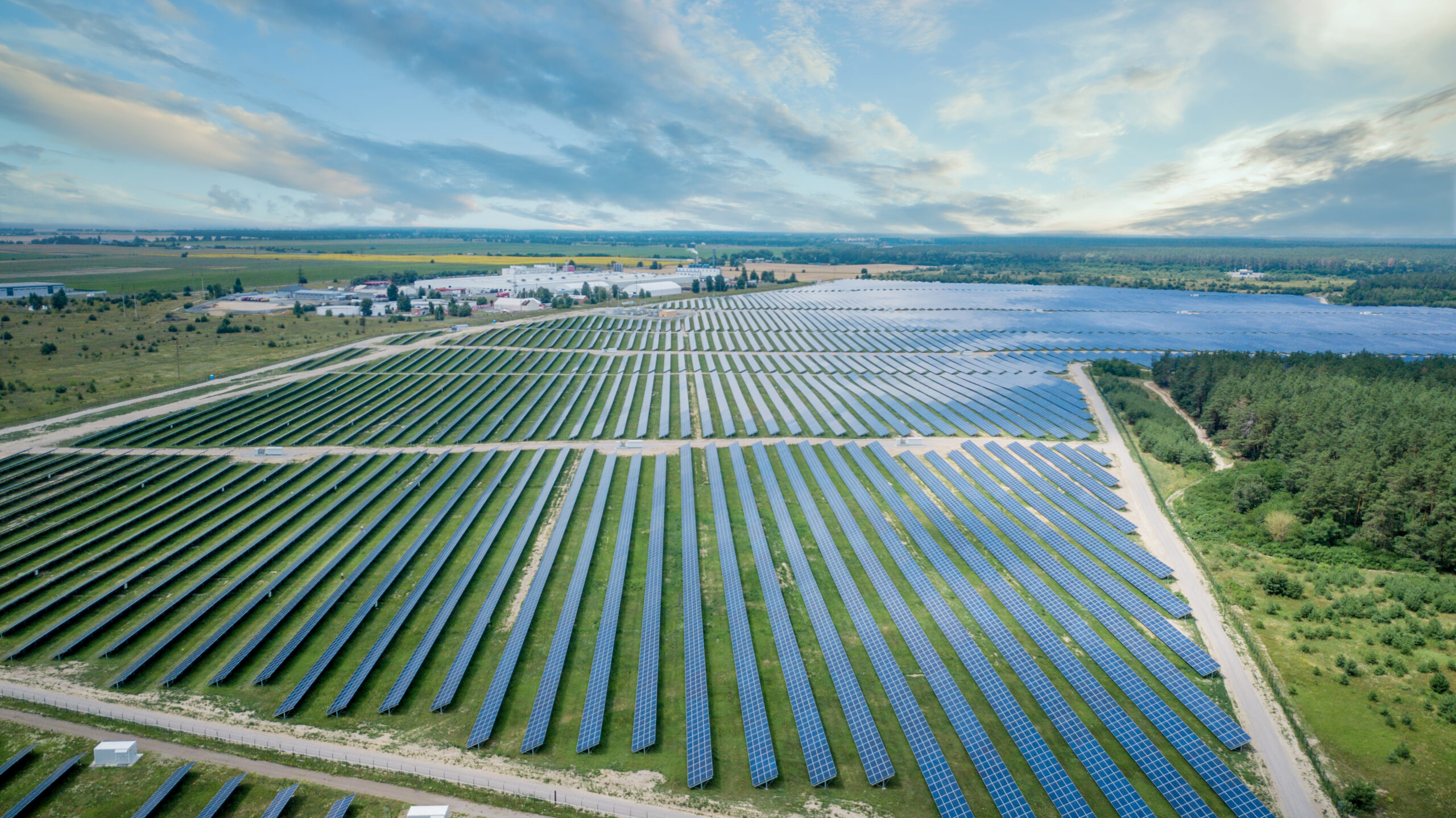 Large solar company array on a sunny field